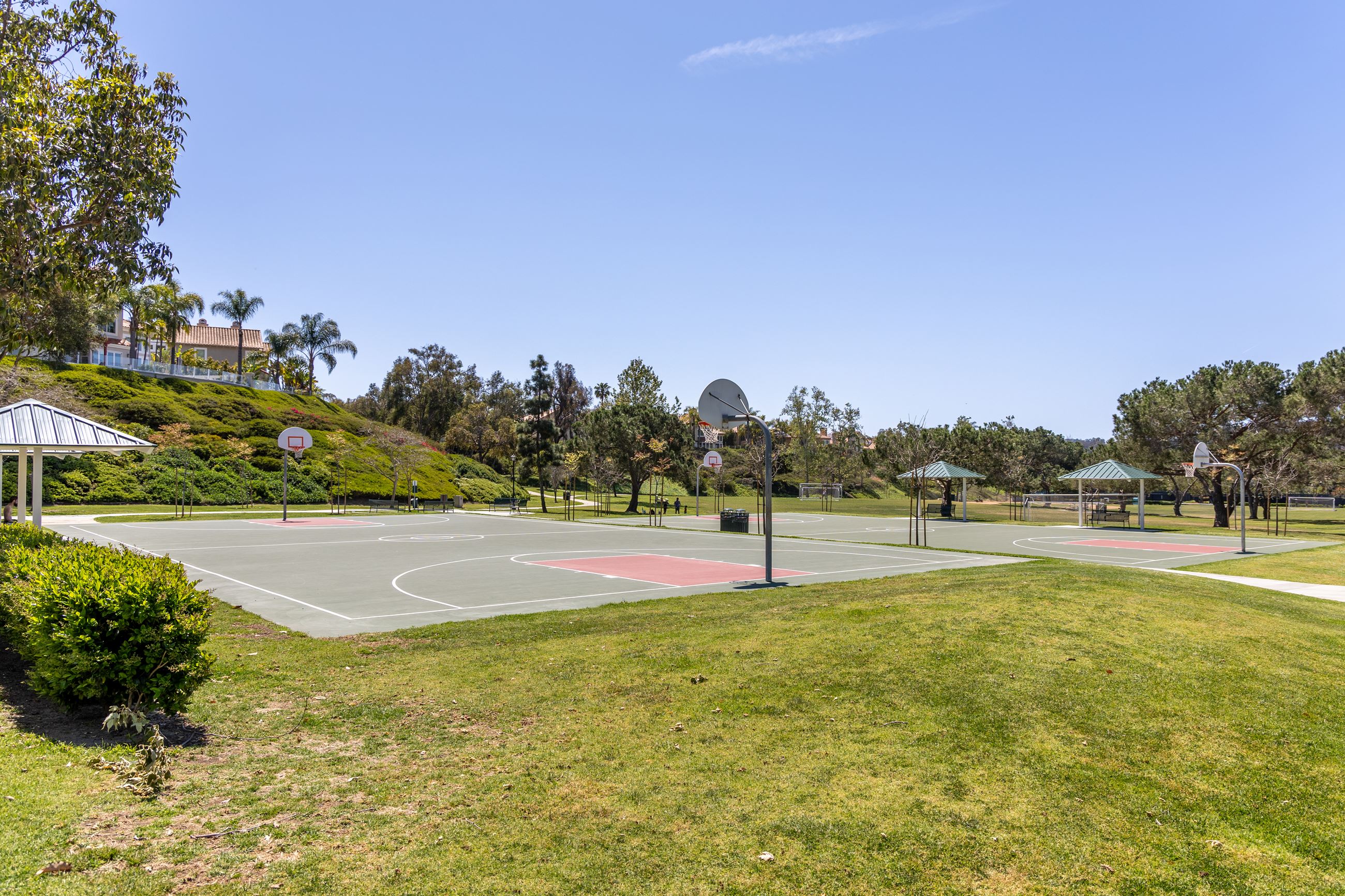 Outdoor basketball courts at Marina Hills Park