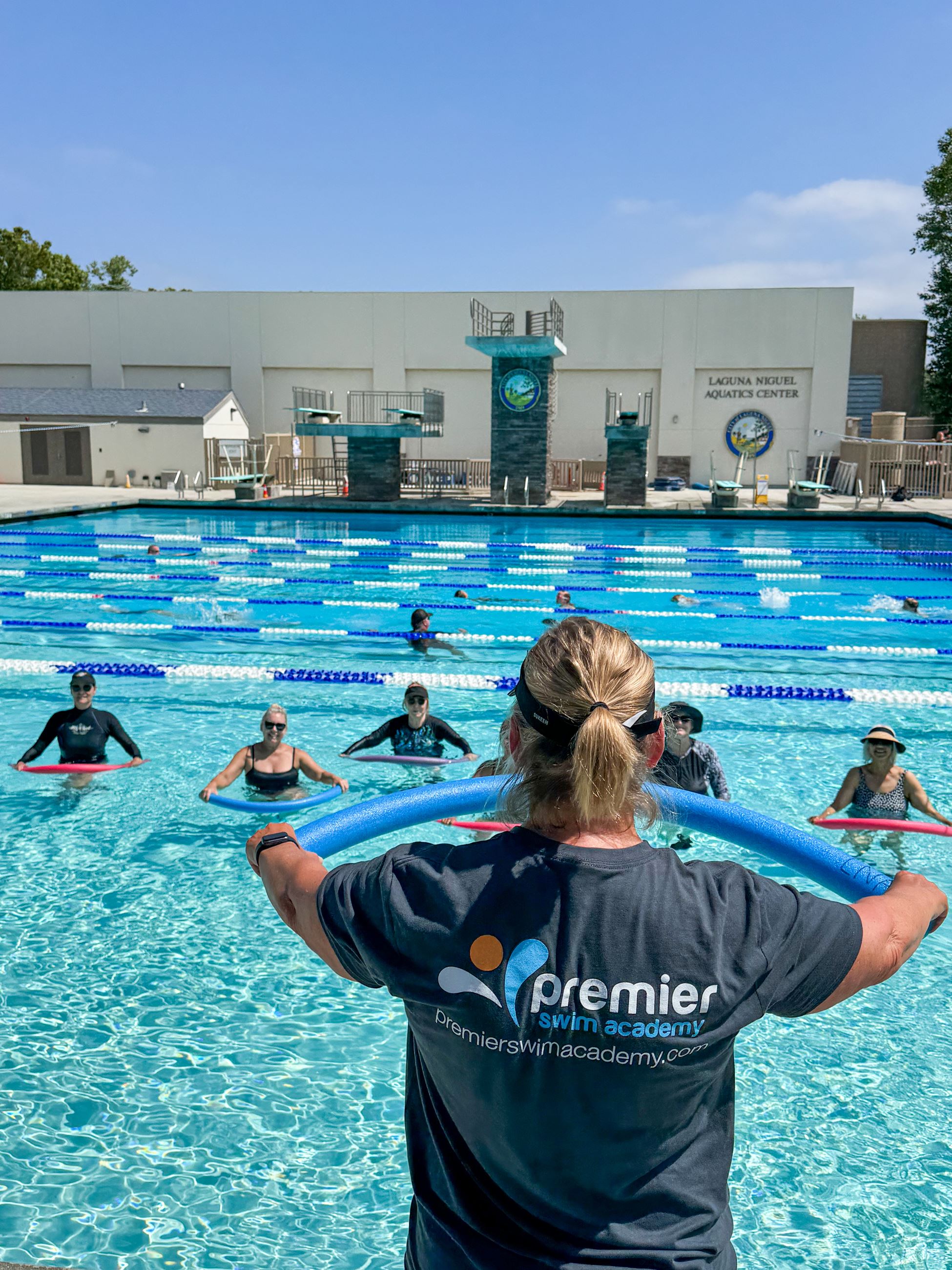 Instructor leads water aerobics class at Laguna Niguel Aquatics Center