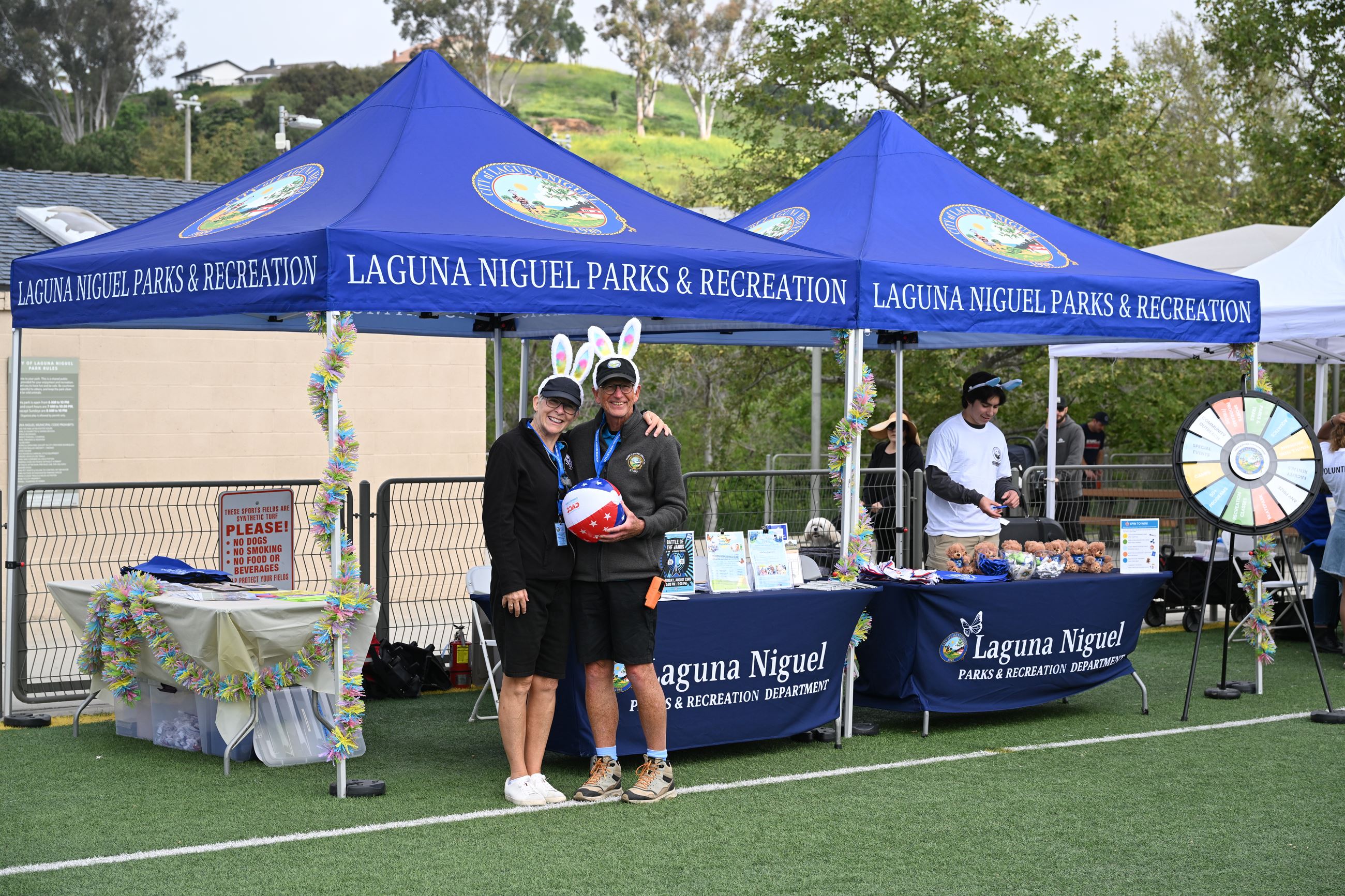 Staff at the Bunny Bonanza smiling with bunny ears on
